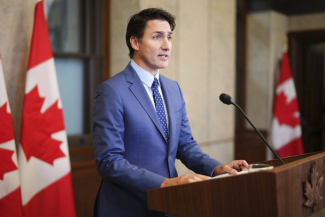 Justin Trudeau: Presiunile economice din SUA şi Europa aproape au împins Canada ”în braţele Chinei”