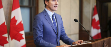 Justin Trudeau: Presiunile economice din SUA şi Europa aproape au împins Canada ”în braţele Chinei”