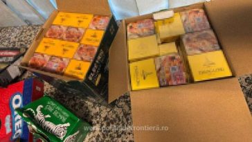 Sute de pachete de ţigări şi tutun vrac, găsite în cutii de dulciuri şi electronice în bagajele unui cetăţean vietnamez, pe Aeroportul Otopeni