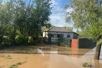 Olt: Inundații în comuna Serbănești, după o avertizare cod galben de preciptații (GALERIE FOTO)