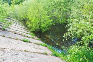 Alba: Intervenţii pentru punerea în siguranţă a iazului de decantare Valea Cuţii, de la Baia de Arieş, după ce nivelul apei a crescut în urma ploilor – VIDEO