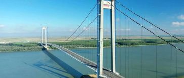 Constructorul italian WeBuild nu a reuşit să blocheze nici în Italia executarea de către CNAIR a garanţiei aferente întârzierilor înregistrate la construcţia podului suspendat de la Brăila