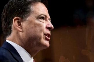 Fostul director al FBI, James Comey, s-a prezentat în faţa justiţiei după ce a fost pus din nou sub acuzare