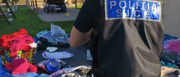 Botoșani: Percheziții într-un dosar privind comerțul cu haine contrafăcute
