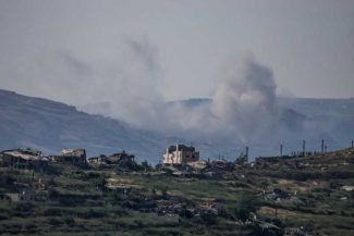 Irak: O grupare proiraniană a predat autorităților o listă cu personalul și armamentul său