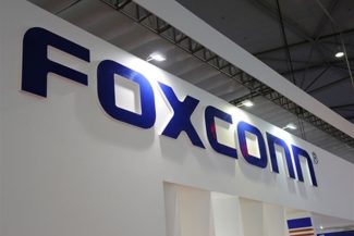 Foxconn îşi majorează veniturile cu aproape 40% datorită boomului AI, dar avertizează asupra riscurilor geopolitice