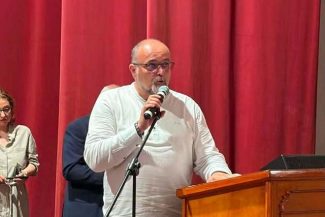 Preot din Topoloveni, suspendat de la slujire şi cercetat disciplinar după ce a preluat conducerea PSD local