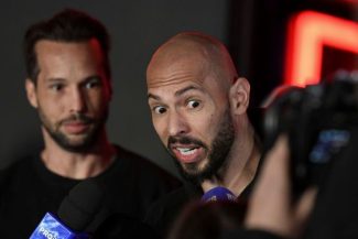 DIICOT a extins cercetările în cazul fraţilor Tate/ Aceştia sunt acuzaţi, printre altele, că au încercat să influenţeze victime şi martori să-şi retragă declaraţiile şi că ar fi vândut maşini de lux aflate sub sechestru