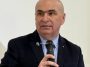 Bolojan anunță că ar urma să fie menținut actualul sistem privind acordarea burselor sociale