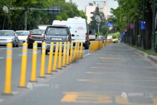 Camera Deputaților: Conducătorii de motociclete și mopede pot utiliza benzile de transport în comun