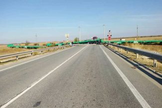 Olt: Circulație rutieră blocată pe Centura Caracal, după deraierea unor vagoane ale unui marfar