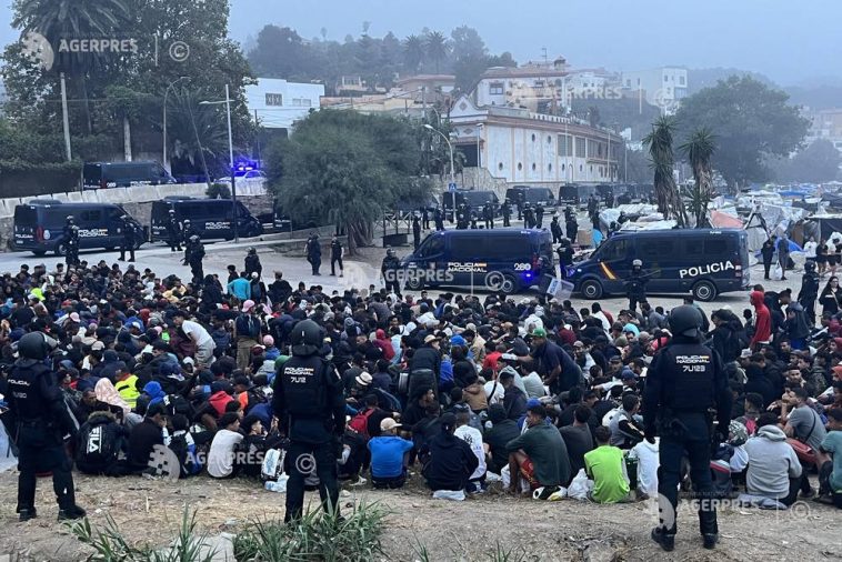 Ceuta: Poliția spaniolă a evacuat o tabără de migranți de pe plajă, înaintea vizitei cuplului regal